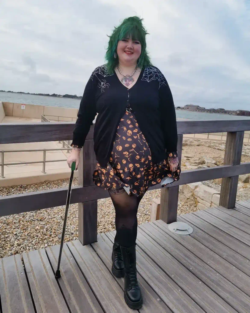 Spiderweb Cardigan Over a Halloween Print Dress